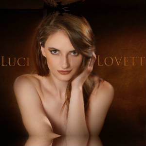 Studio portrait of Luci Lovett.