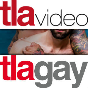 TLAGay and TLAVideo logos allowing a sexy peek at muscled tattooed guys.