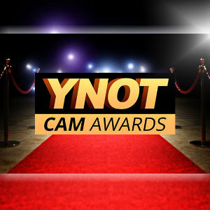 YNOT Cam Awards logo against a background of spotlights and red carpets.