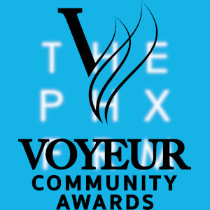 The VOYEUR Community Awards logotype over a large slightly blurry Phoenix Forum logo.